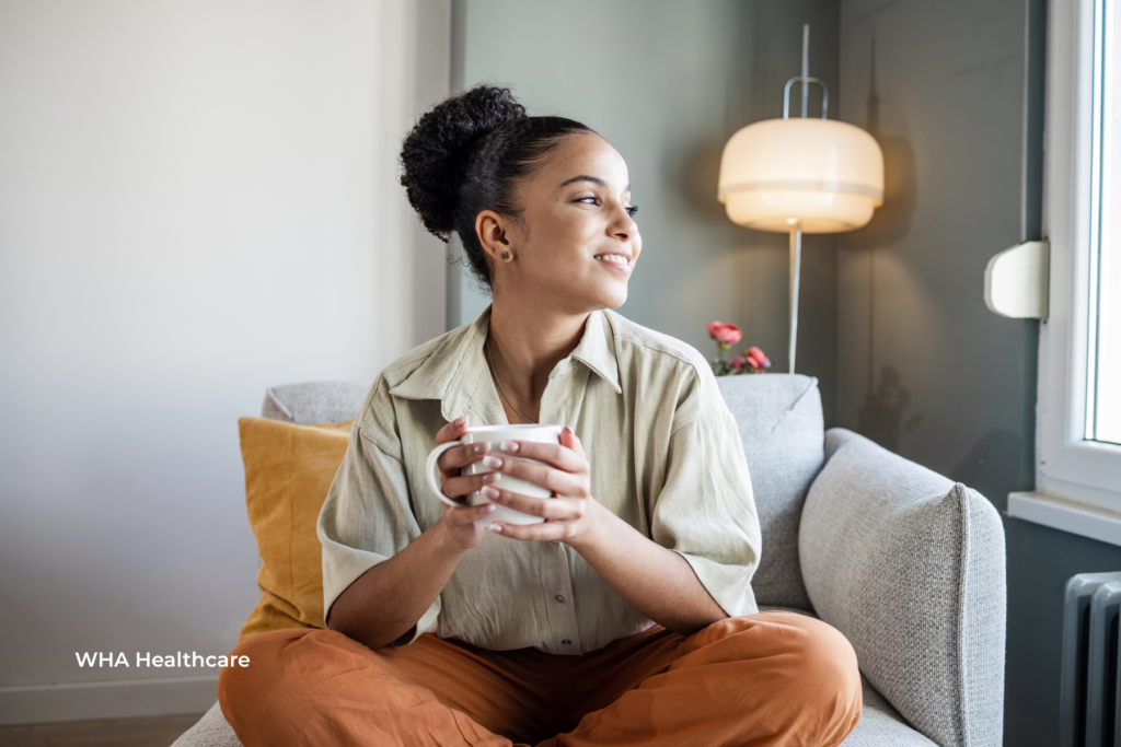 lady sitting thinking about health cash plans support with mental wellbeing